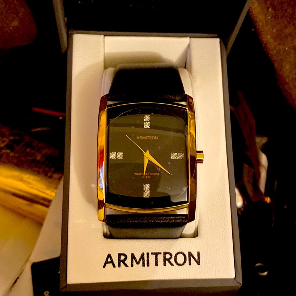 Armitron watch gold and black cover $400